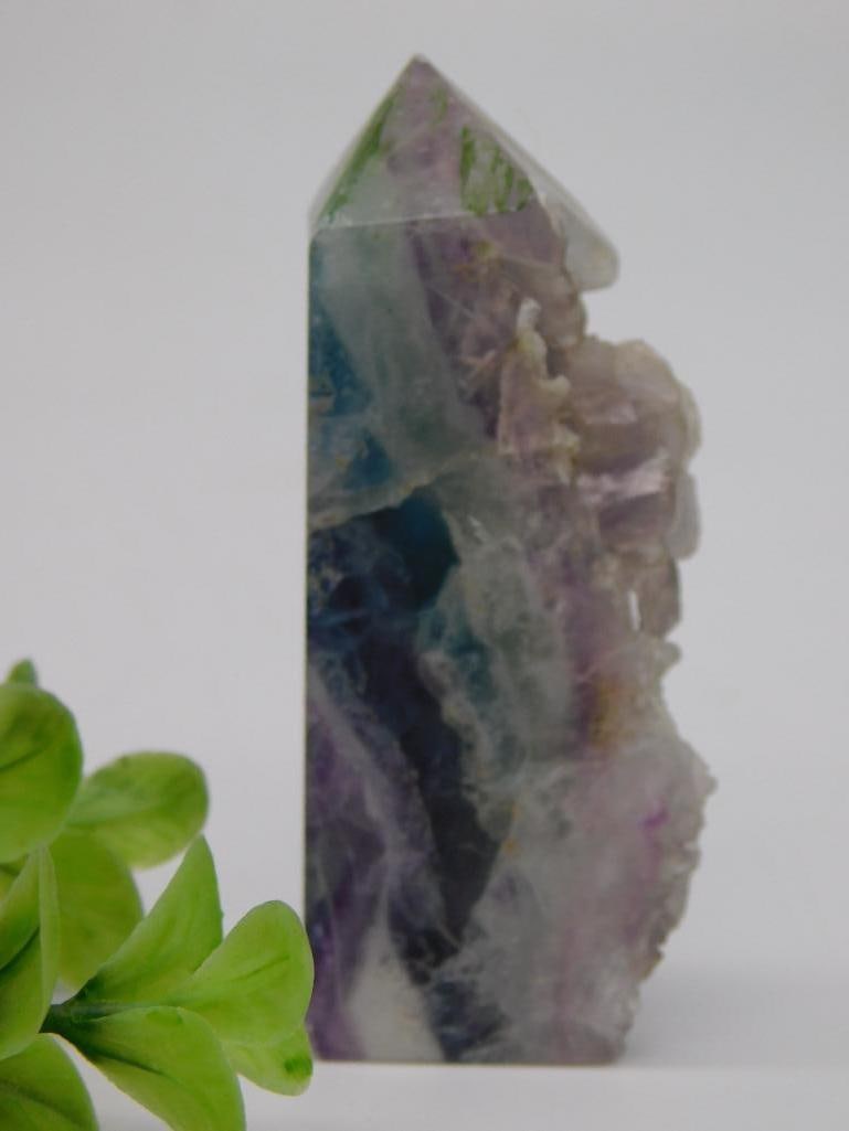 Rainbow Fluorite Crystal Point, Purple Blue Green Banded Specimen: Natural rainbow fluorite crystal point with vivid purple, blue, and green color banding and a rough druzy termination. Approximately 3 inches tall; 72 grams.