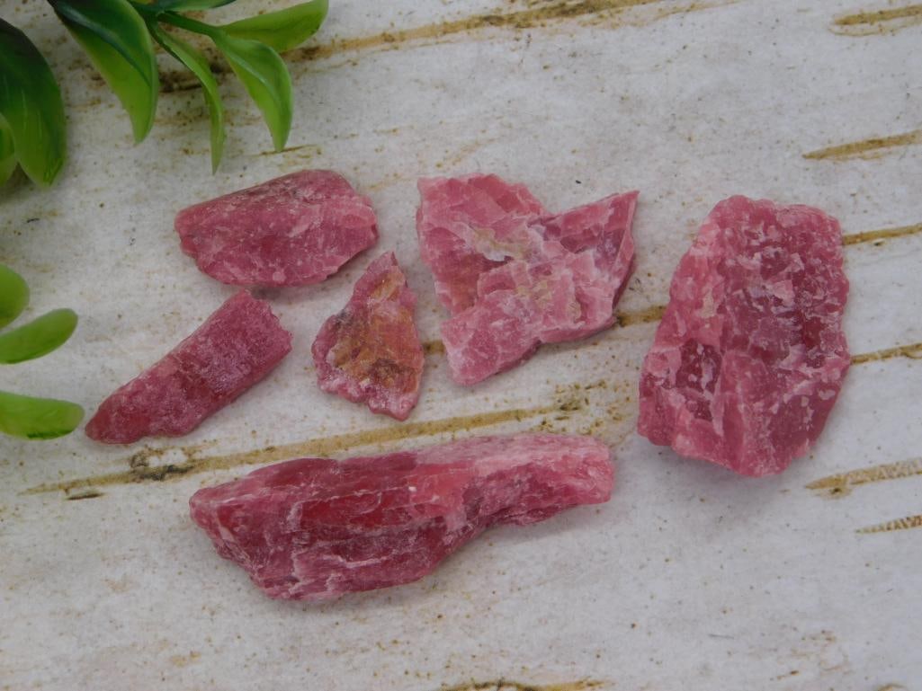 Rough Rhodochrosite Pink Mineral Specimens: Lot of six rough, unpolished pink rhodochrosite mineral chunks, 20 grams total.