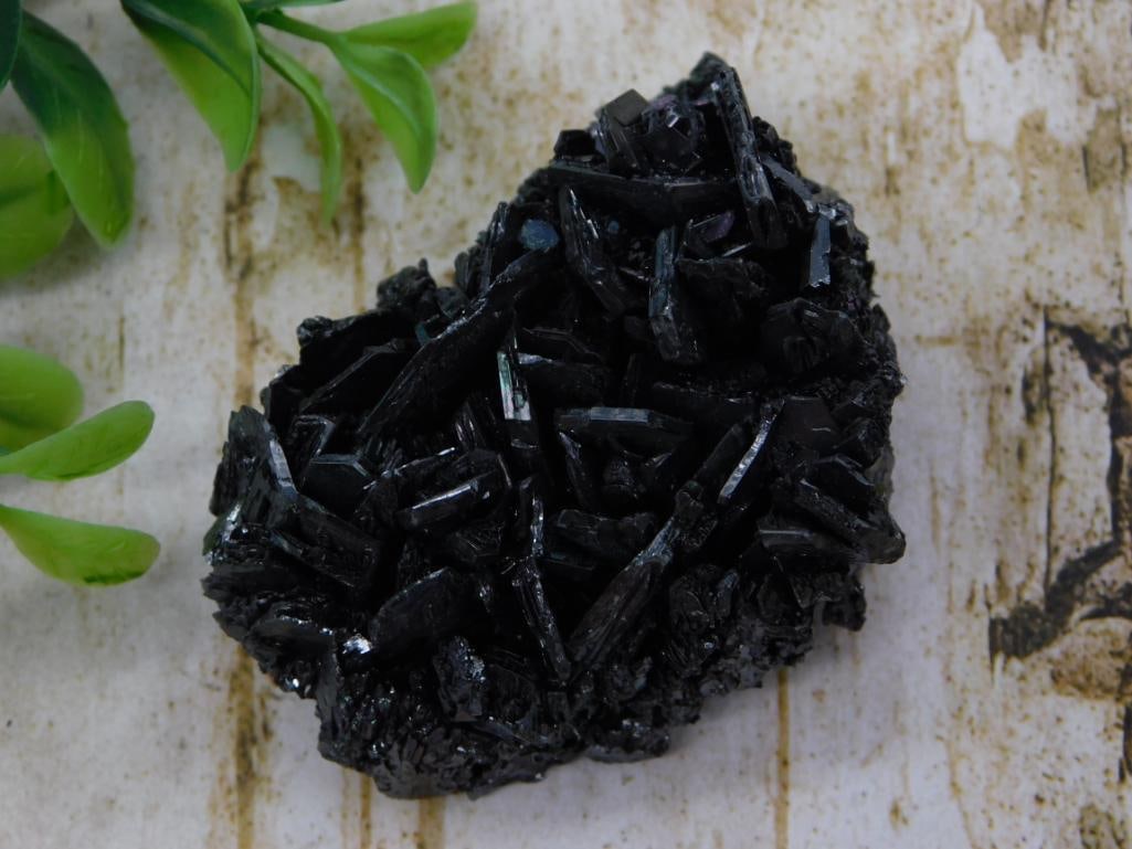 Black Tourmaline Crystal Cluster Specimen: Natural black tourmaline mineral cluster with sharp prismatic crystal terminations, 50 grams.