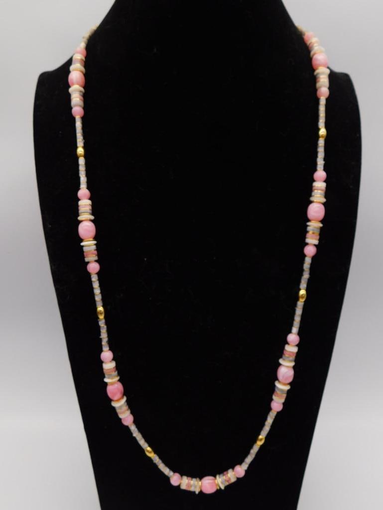 Pink Shell and Bead Long Necklace: Long beaded necklace with pink shell discs, coral-tone round beads, and gold-tone accent beads.
