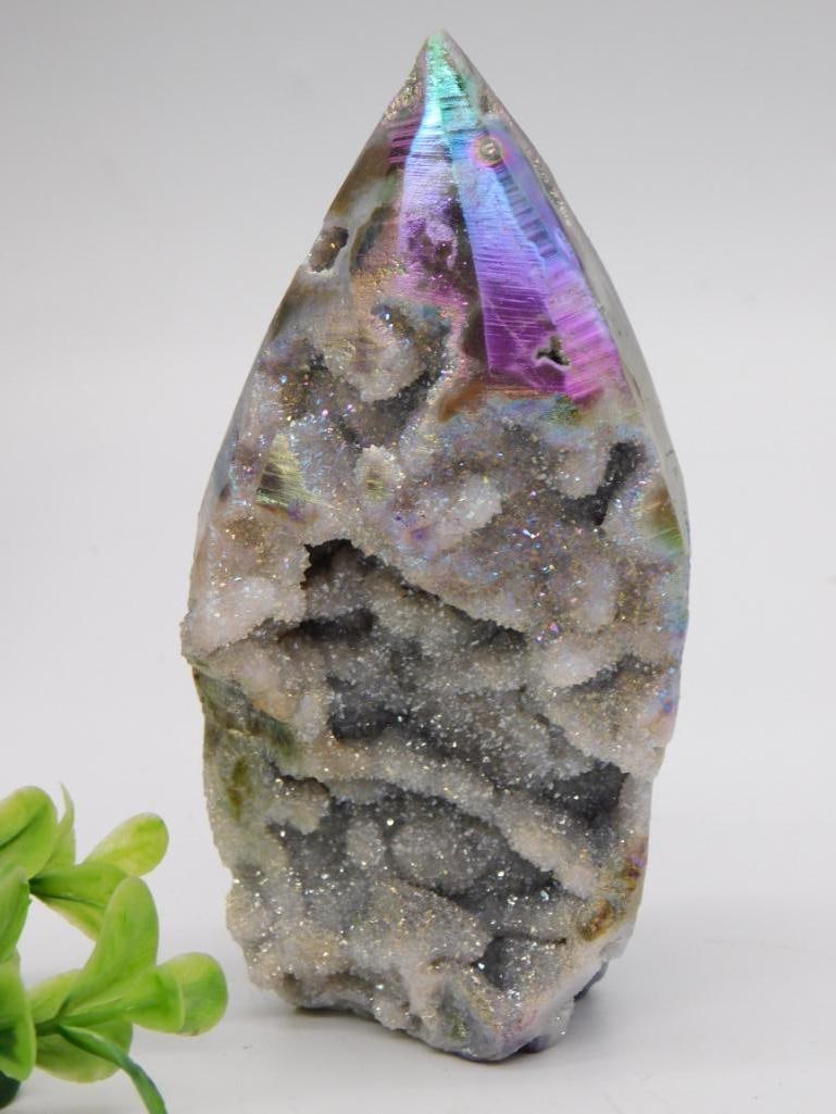 Amethyst Crystal Cluster Geode: Natural crystal geode specimen with druzy quartz and amethyst point formation, iridescent surface.