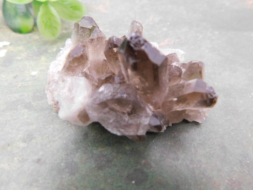 Smoky Quartz Crystal Cluster: Natural smoky quartz crystal cluster on white quartz matrix base.