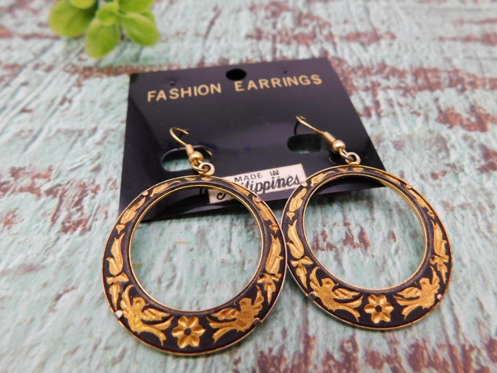 Gold-Tone Filigree Hoop Earrings: Pair of black and gold enamel floral filigree hoop earrings, made in Philippines.