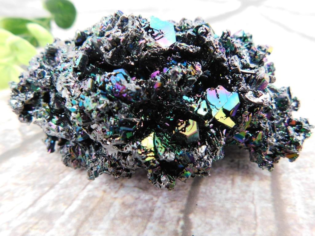 Rainbow Bismuth Crystal Specimen: Iridescent man-made bismuth crystal specimen displaying rainbow metallic coloring.