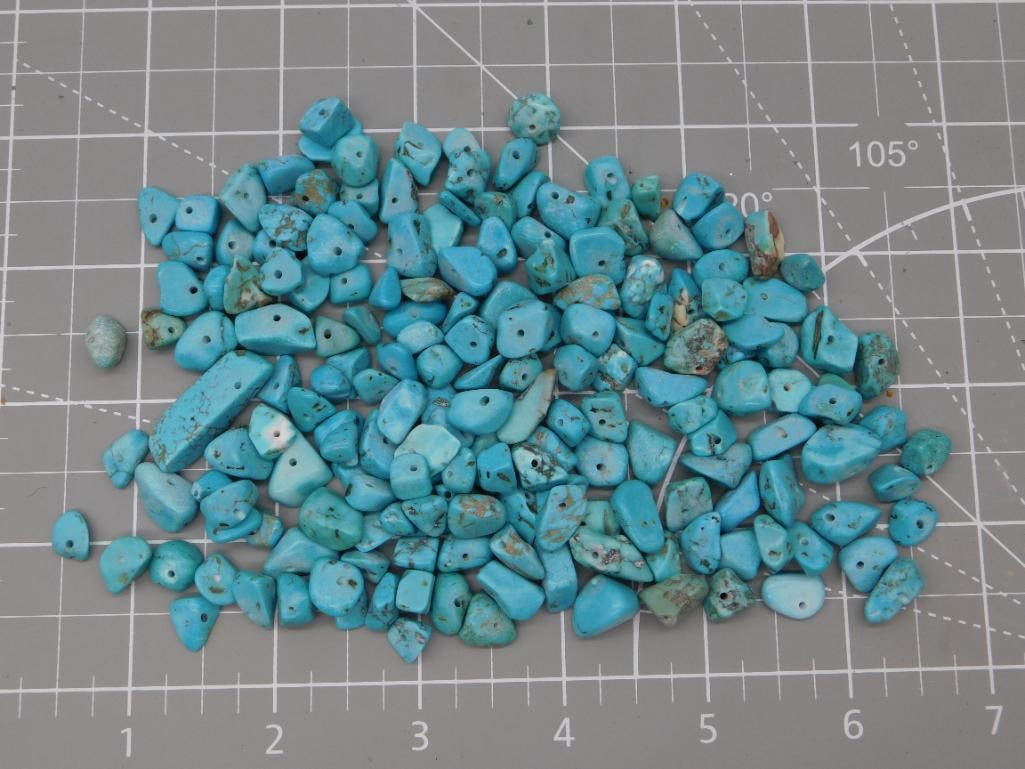 Turquoise Chip Bead Lot, Loose: Approximately 120 grams of loose turquoise chip and nugget beads in varying shades of blue-green, each drilled for stringing. Sizes range from small chips to larger tumbled nuggets with visible brown 