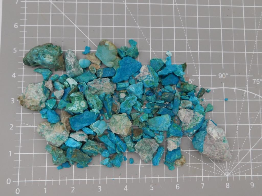 Chrysocolla and Malachite Rough Mineral Lot, 221 Grams: A cluster of rough chrysocolla and malachite mineral chips in vivid turquoise-blue and green tones with some quartz matrix inclusions. The specimens are small, jagged pieces ranging from chip-sized to