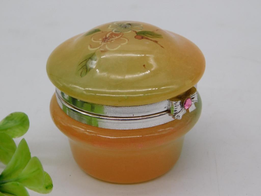 Genuine Alabaster Hinged Trinket Box with Hand-Painted Floral Design: Round orange and yellow alabaster hinged trinket/jewelry box with a hand-painted floral design and gilt rim with a pink rhinestone clasp accent, marked "Genuine Alabaster, Hand Crafted in Italy for Gi
