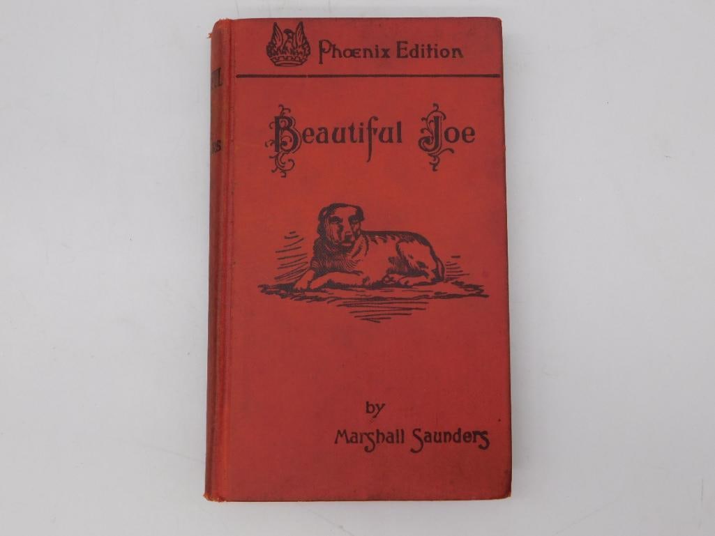 Book: Beautiful Joe by Marshall Saunders, Phoenix Edition Antique Hardcover: Antique red cloth hardcover 'Beautiful Joe' by Marshall Saunders, Phoenix Edition, published March 1903 by the American Baptist Publication Society with copyright entered 1893. Front board features a