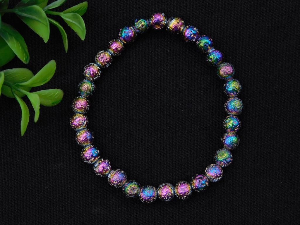 Bracelet: Rainbow Titanium-Coated Druzy Agate Beaded Bracelet: Stretch bracelet made of round druzy agate beads coated in an iridescent rainbow titanium finish, displaying purple, blue, green, and gold flashes, each bead approximately 8-10mm. Elastic cord in good