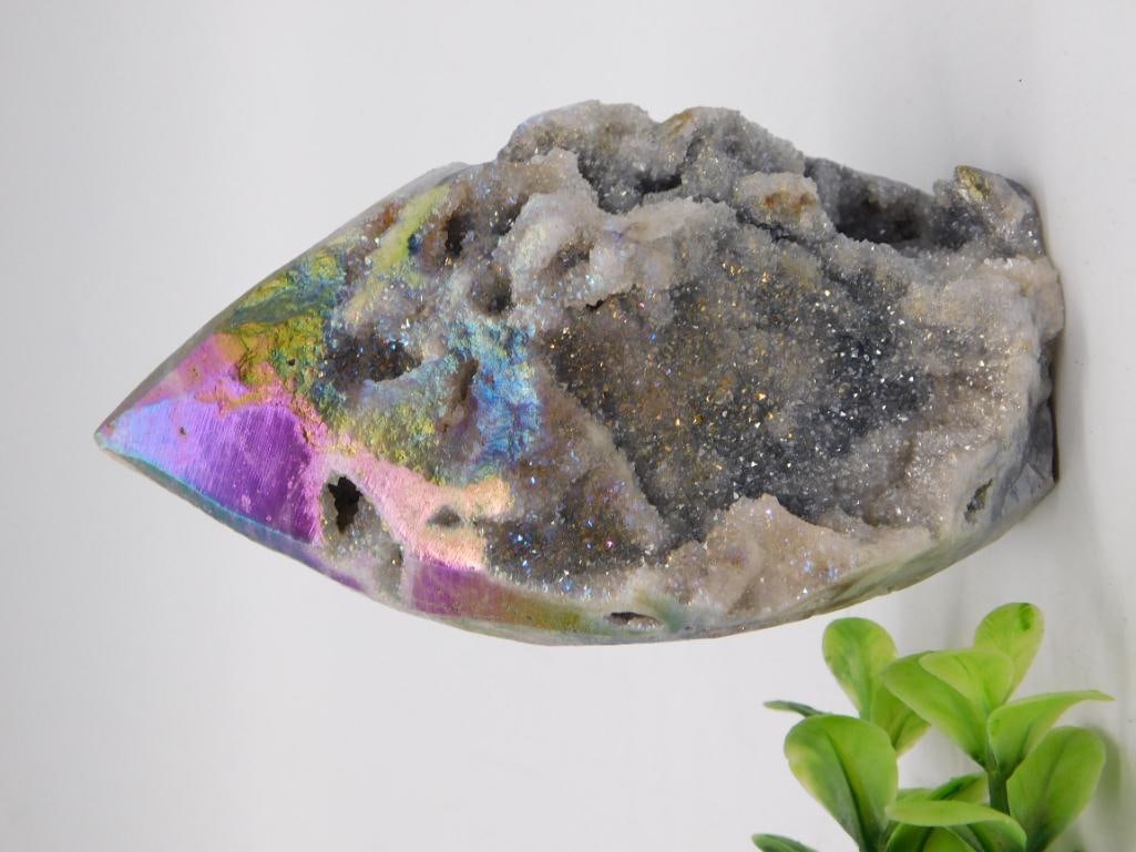 Rainbow Aura Titanium-Coated Crystal Geode Specimen - 202 Grams: A druzy quartz geode half treated with a rainbow titanium aura coating, displaying iridescent purple, blue, green, and gold color-shifting crystals surrounding a natural sparkling gray quartz cluster 
