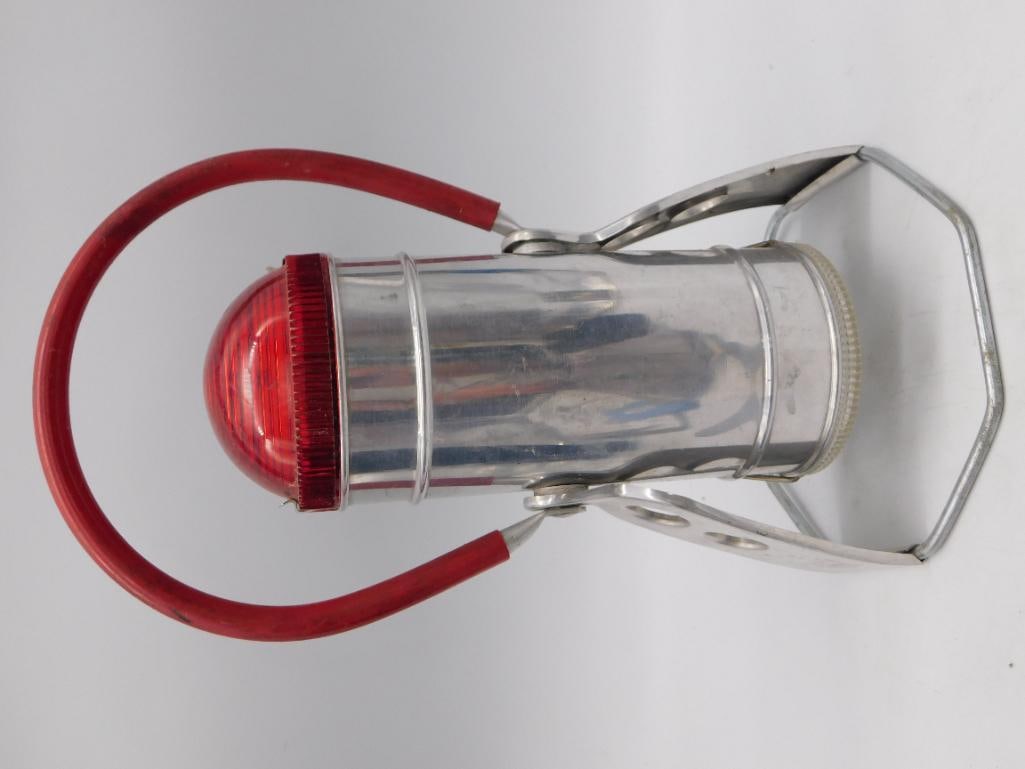 Vintage Snapit Dual-Beam Lantern Flashlight: Chrome-plated metal "Snapit Dual-Beam Lantern" (Pat. Pend.) with a red glass/plastic lens dome and folding red-coated wire carry handle, standing approximately 6 inches tall per the ruler shown. Body