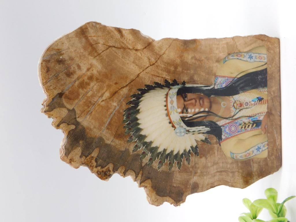 Petrified Wood Slab with Native American Chief Portrait Decoupage: Polished petrified wood slab, natural free-form edge, featuring a decoupaged/lacquered color image of a Native American chief in full feather headdress. Approximately 6 inches wide as measured against