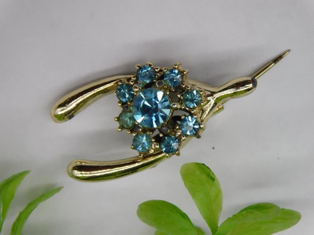 Vintage Gold-Tone Wishbone Brooch With Blue Rhinestones: Vintage Gold-Tone Wishbone Brooch With Blue Rhinestones