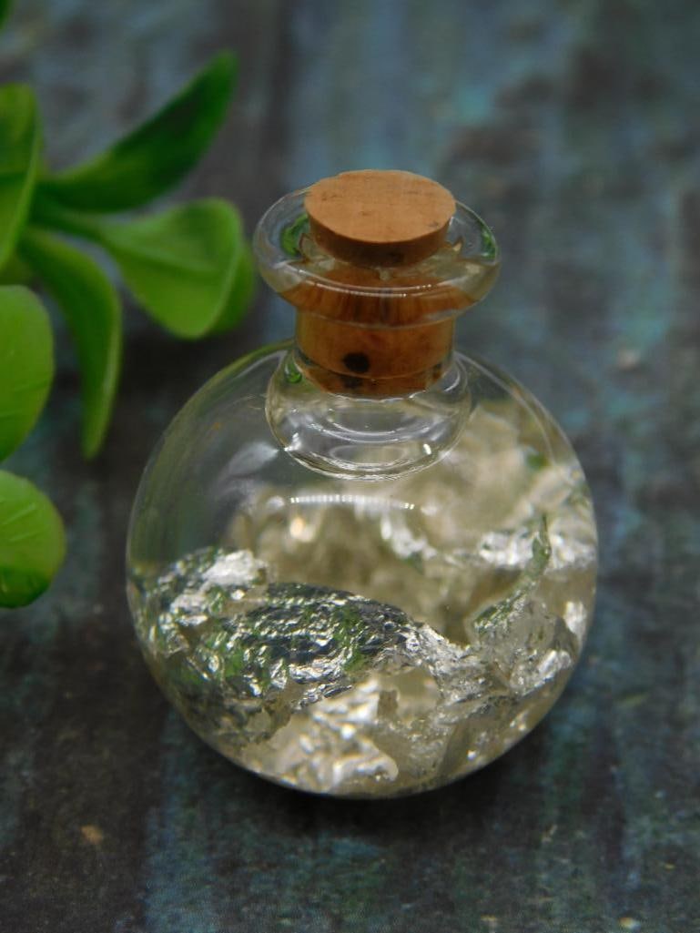 Glass Bottle With Silver Flakes and Cork Stopper ROCK STONE LAPIDARY SPECIMEN: Glass Bottle With Silver Flakes and Cork Stopper ROCK STONE LAPIDARY SPECIMEN