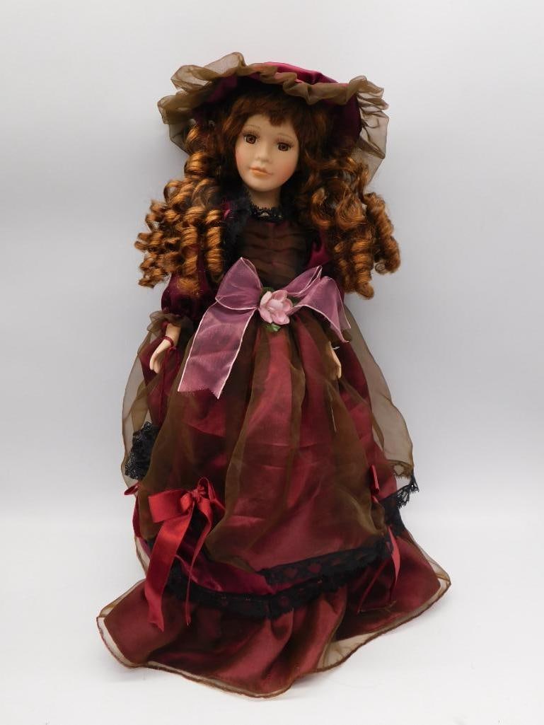 VICTORIAN BEAUTY VINTAGE PORCELAIN DOLL WITH RED DRESS AND HAIR AND PINK BOW: VICTORIAN BEAUTY VINTAGE PORCELAIN DOLL WITH RED DRESS AND HAIR AND PINK BOW