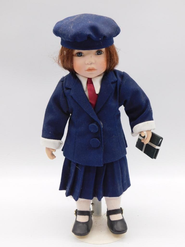 PORCELAIN SCHOOL GIRL DOLL IN BLUE UNIFORM VINTAGE TOY: PORCELAIN SCHOOL GIRL DOLL IN BLUE UNIFORM VINTAGE TOY