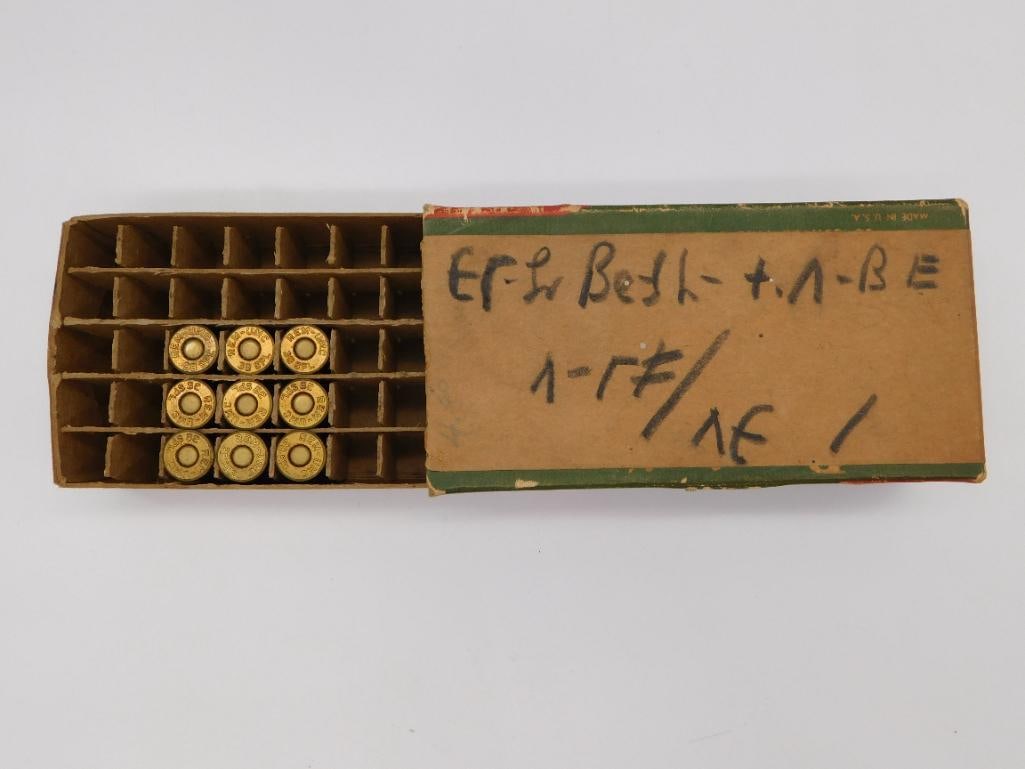Vintage Remington Targetmaster .38 Special Ammunition Box: Vintage box of Remington-UMC .38 Special Targetmaster ammunition with brass casings, partial box with handwritten label, in original cardboard packaging.