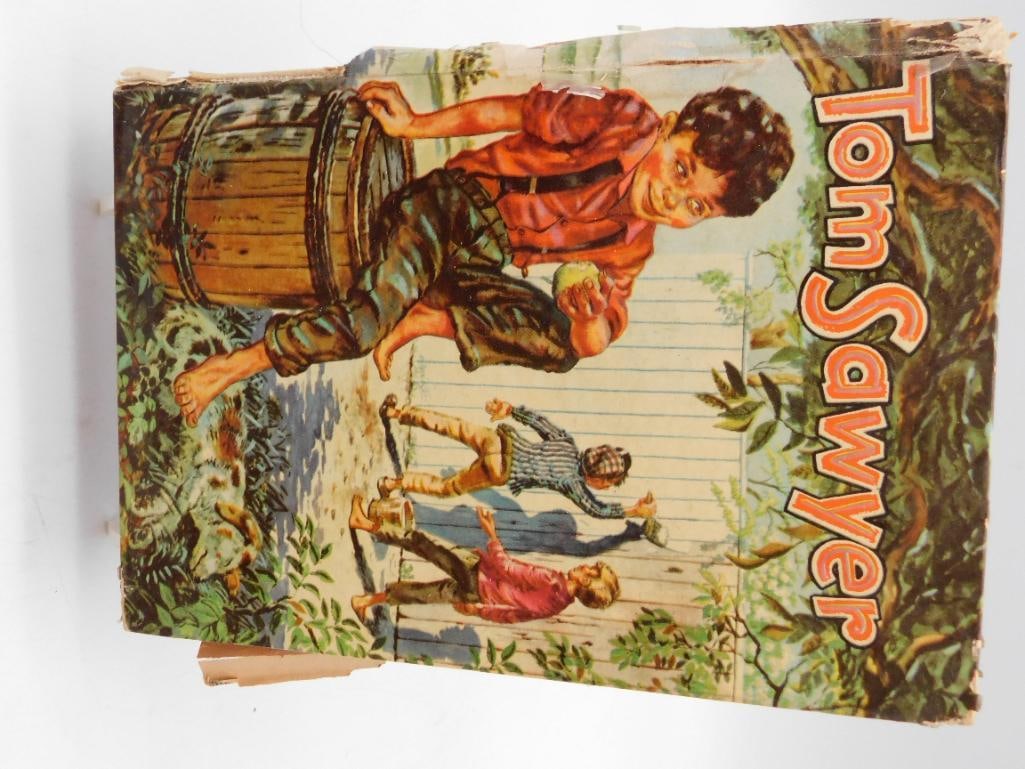 Vintage Tom Sawyer Illustrated Hardcover Whitman 1955: A well-loved hardcover copy of Tom Sawyer published by Whitman Publishing Company of Racine Wisconsin copyright 1955. The colorful cover art shows expected wear along the spine and edges from age and