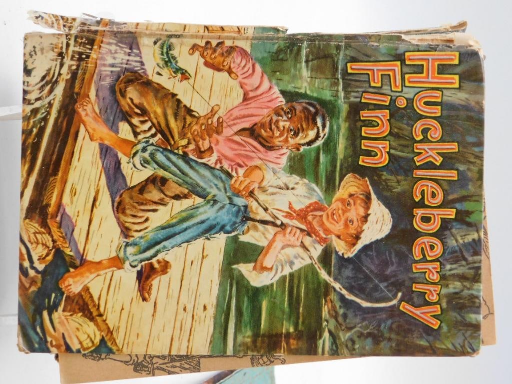 Vintage Huckleberry Finn Illustrated Hardcover Whitman Publishing: A hardcover copy of Huckleberry Finn from Whitman Publishing Company with copyright dates spanning 1939 to 1955. A nice piece for vintage book collectors.