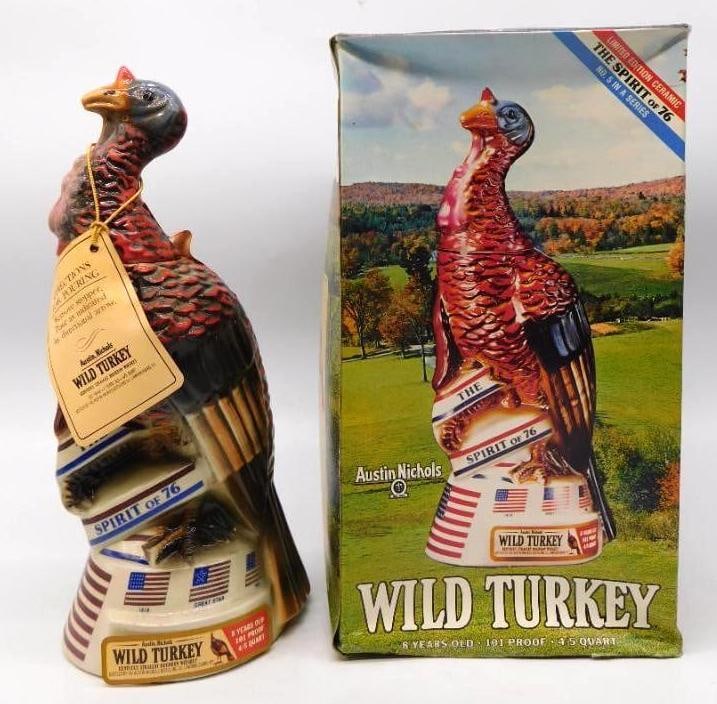 Wild Turkey Austin Nichols Spirit of 76: An Austin Nichols Wild Turkey decanter, the fifth in the Spirit of 76 series, modeled as a wary tom turkey perched upon a drum-form plinth of flags and fifes. The painter did not stint on the barred