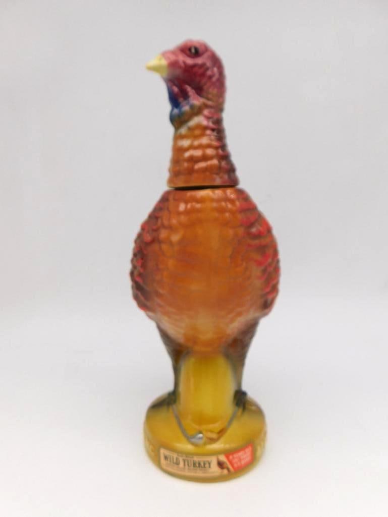 Wild Turkey Austin Nichols Miniature: A miniature Austin Nichols Wild Turkey ceramic decanter, small in stature but nicely modeled as the bird itself. Marked 8 years old, the base reading Liquor Bottled 1971. The tax stamp remains intact.
