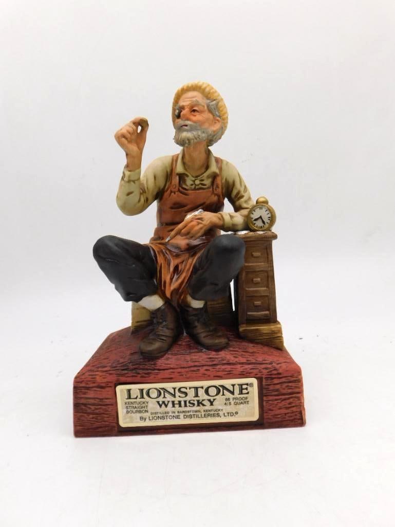 Lionstone The Watchmaker European: A Lionstone Kentucky Straight Bourbon Whiskey porcelain decanter titled "The Watchmaker," from the European Workers Series, modeled as a seated craftsman at his workbench with a pocket watch and a