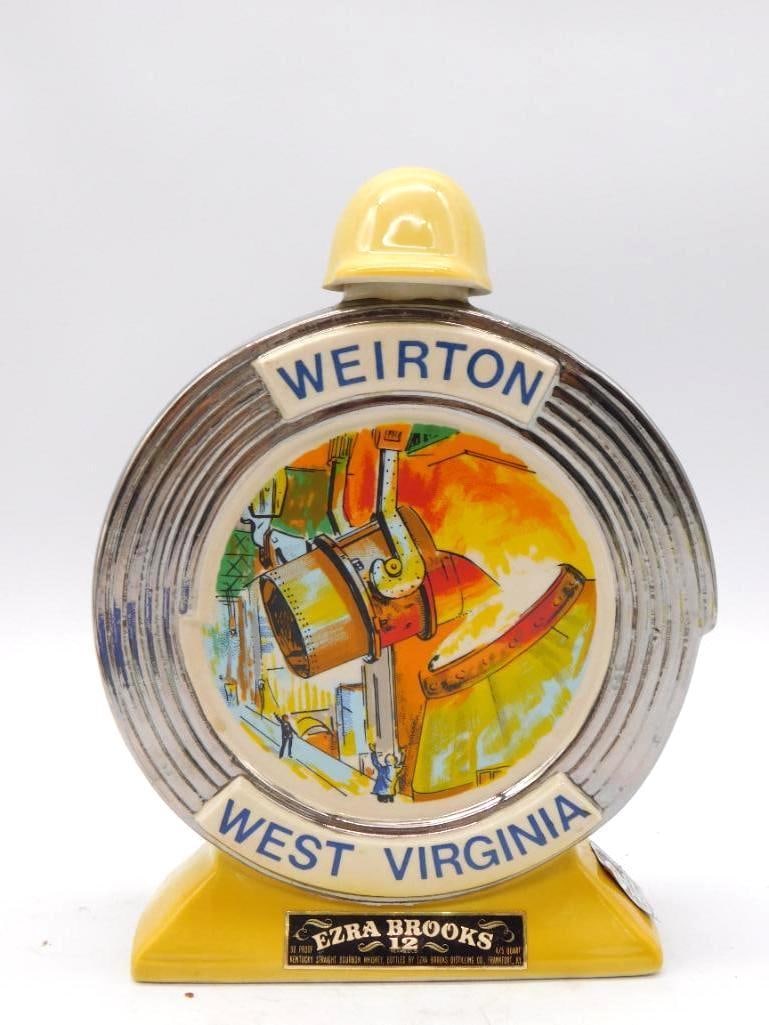 Ezra Brooks Weirton WV Steel Mill and: Two round chrome-effect Ezra Brooks ceramic decanters, each capped with a yellow hardhat: one commemorating the Weirton, West Virginia steel mill, the other bearing the Pittsburgh Steelers team logo.