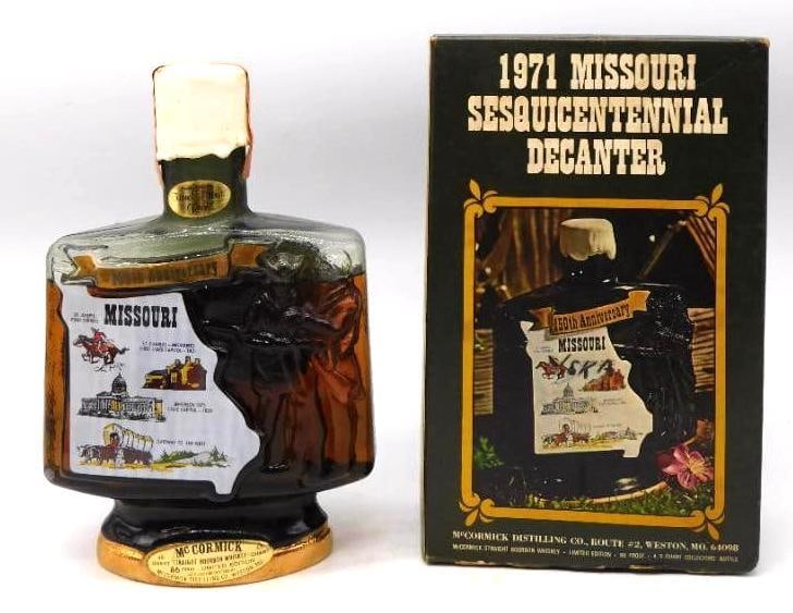 McCormick 1971 Missouri Sesquicentennial: A McCormick decanter struck for the 1971 Missouri Sesquicentennial, its smoked glass panel bearing the state outline with the Pony Express rider, both capitols, and a covered wagon bound for the