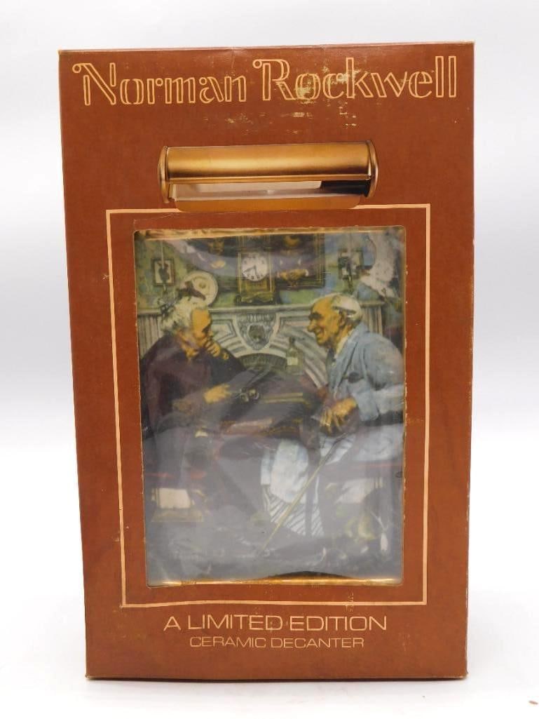 Norman Rockwell Triple Self-Portrait: A limited edition ceramic decanter by The Mike Wayne Distilling Co. of Bardstown, Kentucky, carrying Norman Rockwell's Triple Self-Portrait scene and fitted with a gold-tone handle. A capital subject 