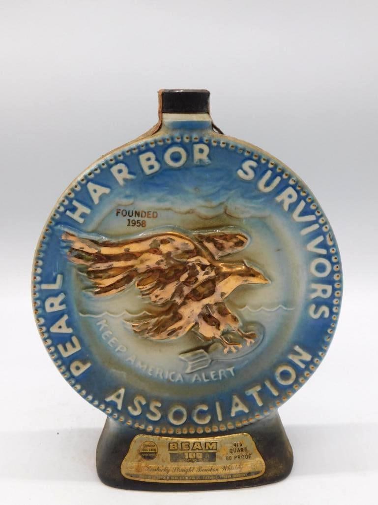 Jim Beam Pearl Harbor Survivors: A round ceramic Jim Beam medallion decanter honoring the Pearl Harbor Survivors Association, "Founded 1958," with an embossed eagle and the "Keep America Alert" motto. Labeled Beam Kentucky Straight