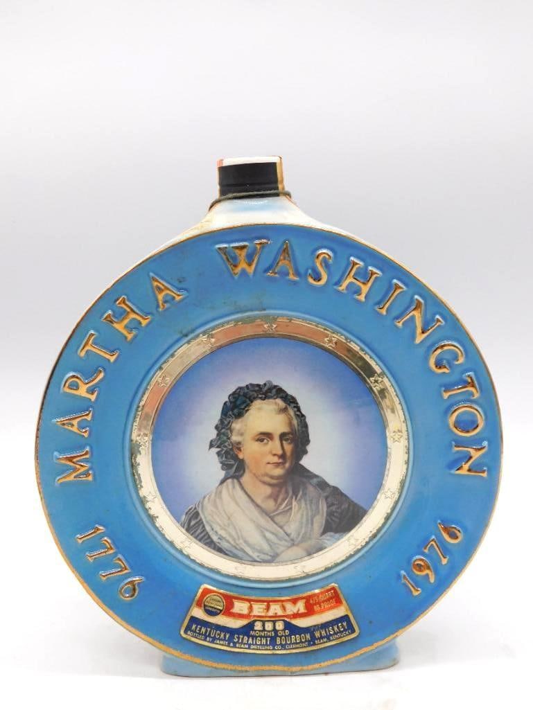 Jim Beam Martha Washington Bicentennial: A Jim Beam 200 Months Old Kentucky Straight Bourbon Whiskey decanter in the form of a commemorative plate, bearing a portrait of Martha Washington for the 1776-1976 Bicentennial. Approximately 8