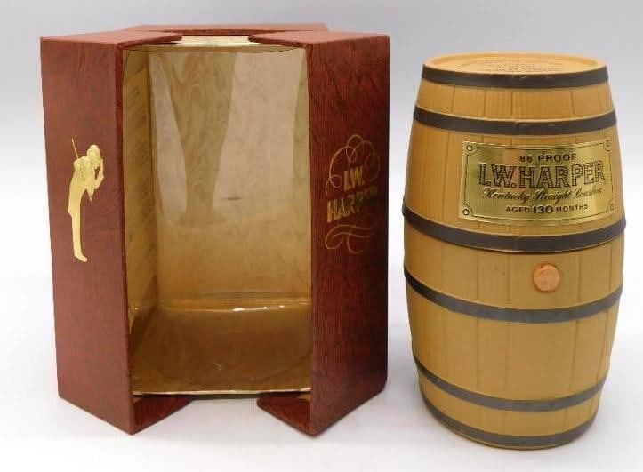 RARE I.W. Harper Bicentennial Barrel: An I.W. Harper Kentucky Straight Bourbon decanter of the bicentennial edition, shaped as a miniature oak barrel, aged 130 months at 86 proof. Comes with the original box marked Bicentennial Edition. A