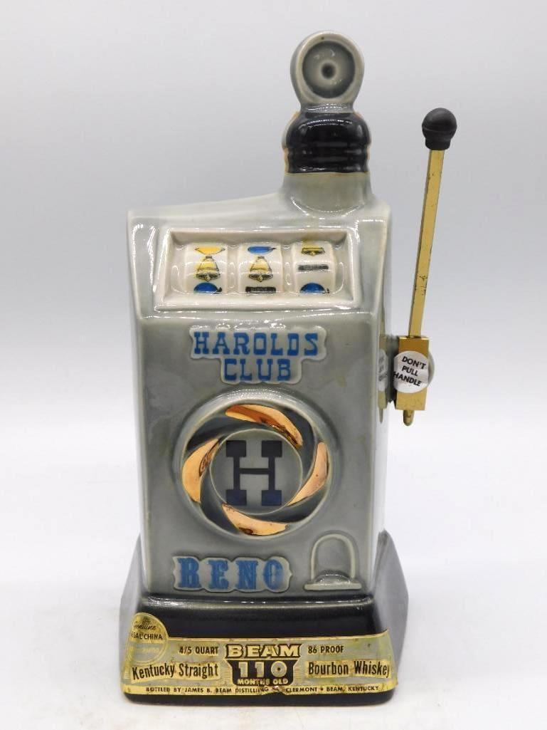 Jim Beam Harold's Club Reno Nevada Slot: A Jim Beam decanter shaped as a Harold's Club Reno slot machine, its reels molded in relief and its lever lettered Don't Pull Handle. Marked Kentucky Straight Bourbon Whiskey, 86 proof. A lively