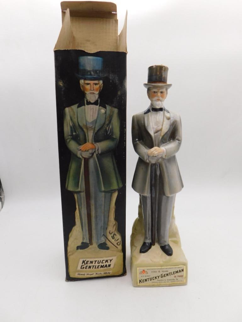 Kentucky Gentleman Top Hat Decanter, 18: A dignified "Kentucky Gentleman" ceramic decanter modeled as a gentleman in top hat and tailcoat, a cane held in his hand. Aged 18 years, 86 proof, 4/5 quart, and complete with its original illustrate