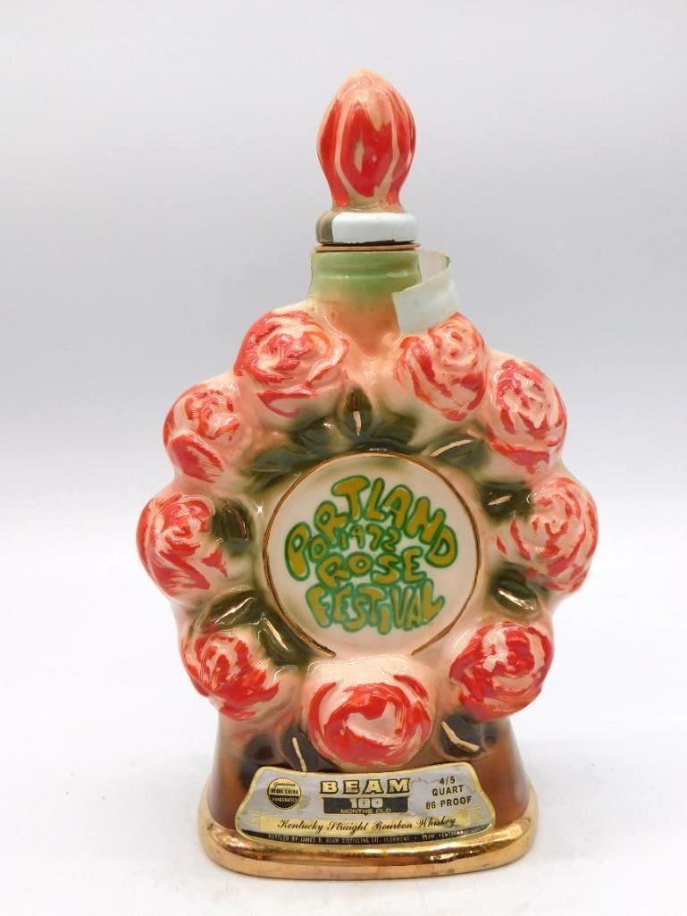 Jim Beam 1972 Portland Rose Festival: A Jim Beam ceramic decanter honoring the 64th Annual Portland Rose Festival of Oregon, molded with a wreath of pink roses and finished with a pink bud stopper. Kentucky Straight Bourbon Whiskey, 86