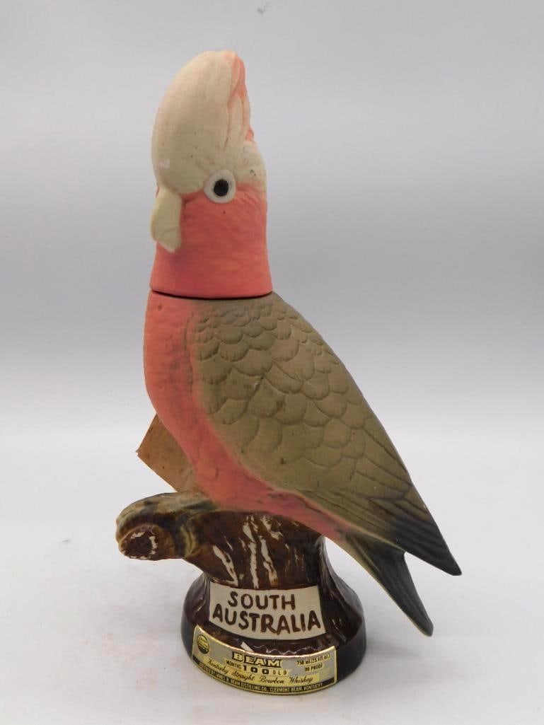 Jim Beam South Australia Galah Bird: A Jim Beam Regal China decanter modeled as the Australian Galah, that pink and grey cockatoo, marked South Australia on the base with the Kentucky Straight Bourbon Whiskey label and its original