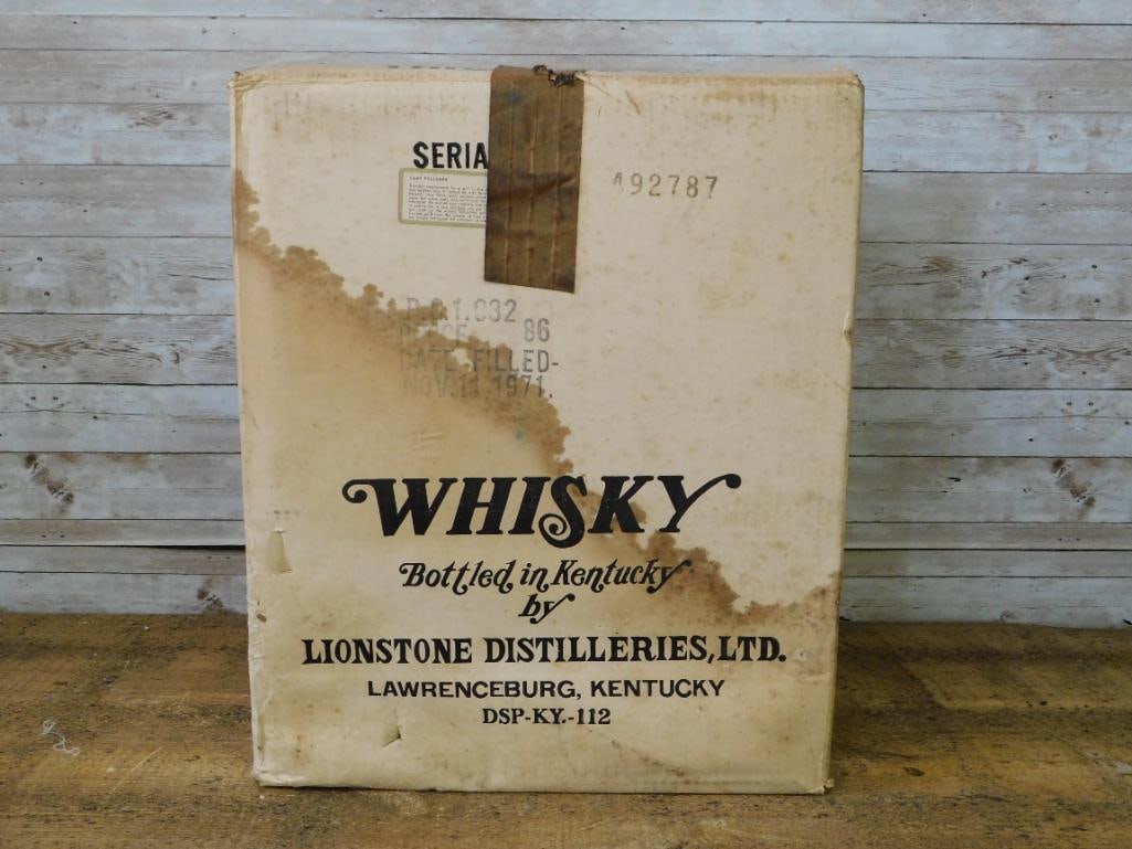Lionstone Distilleries Orig Whiskey Box: The original cardboard shipping box for a Lionstone Distilleries decanter, printed "Whisky, Bottled in Kentucky, Lionstone Distilleries Ltd., Lawrenceburg, Kentucky" with "Another Lionstone
