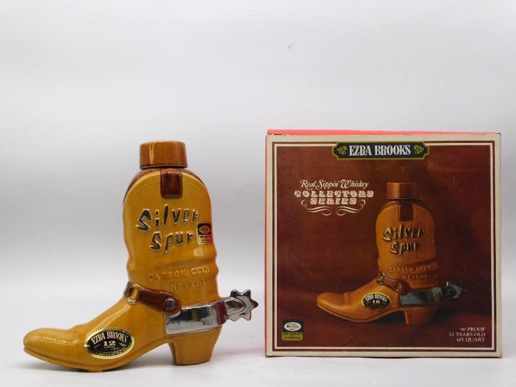 Ezra Brooks Silver Spur Carson City: A handsome Ezra Brooks decanter modeled as a cowboy boot with a bright chrome spur at the heel, the shaft lettered Silver Spur, Carson City, Nevada. The amber glaze is warm and even, and the tooling