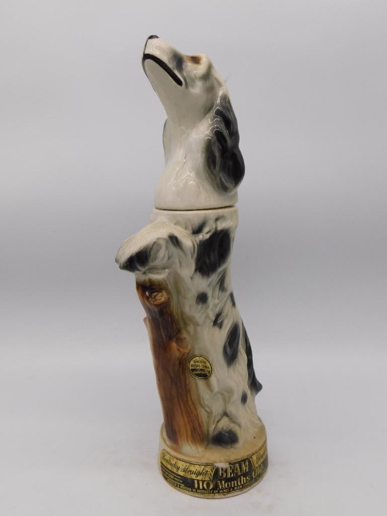 Ceramic Dalmatian Dog Decanter, Unmarked: A ceramic decanter modeled as a seated Dalmatian, hand-painted in classic black-spotted white with an alert, upright pose. No maker's mark is visible in the accompanying photos, so the manufacturer