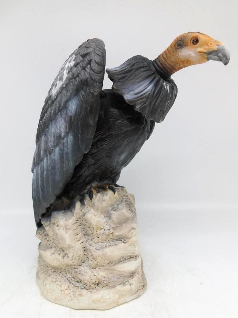 Condor Perched on Rock Ceramic Bird: A commanding bird decanter modeled as a condor perched upon a rocky outcrop, wings half raised and the great hooked bill turned to one side. The matte bisque finish suits the subject, the slate and
