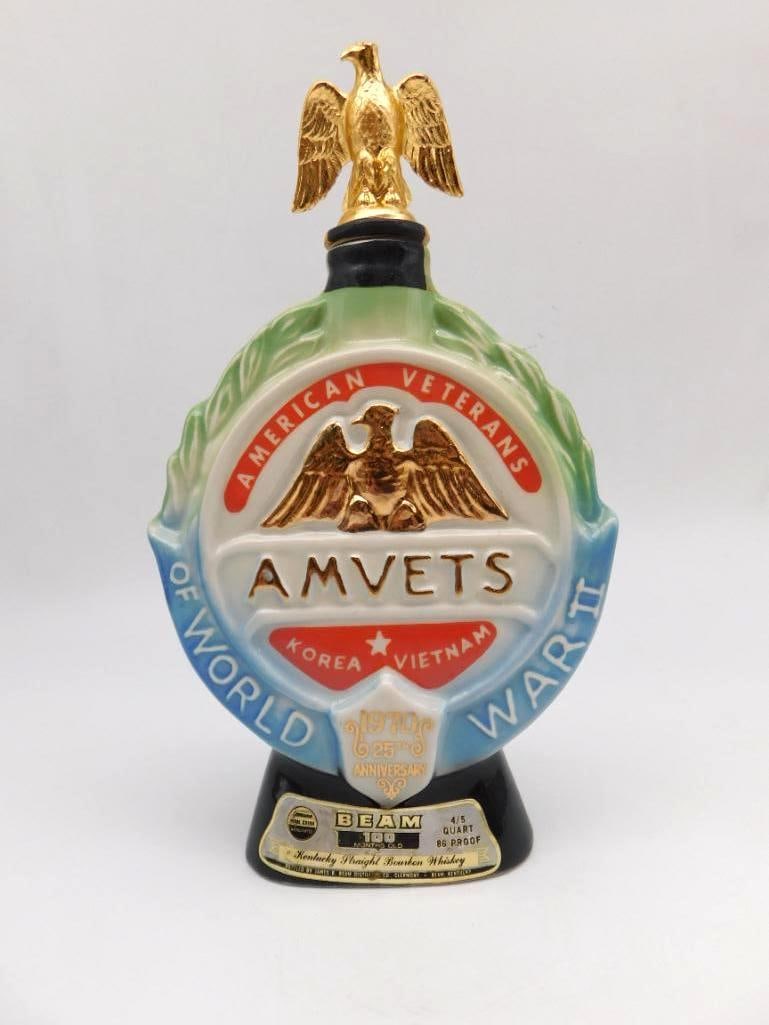 Jim Beam AMVETS 25th Anniv. 1970 Eagle: A Jim Beam Regal China decanter crowned with a gold-tone spread eagle, struck in 1970 for the 25th Anniversary of the American Veterans of World War II, Korea, and Vietnam. The Kentucky Straight