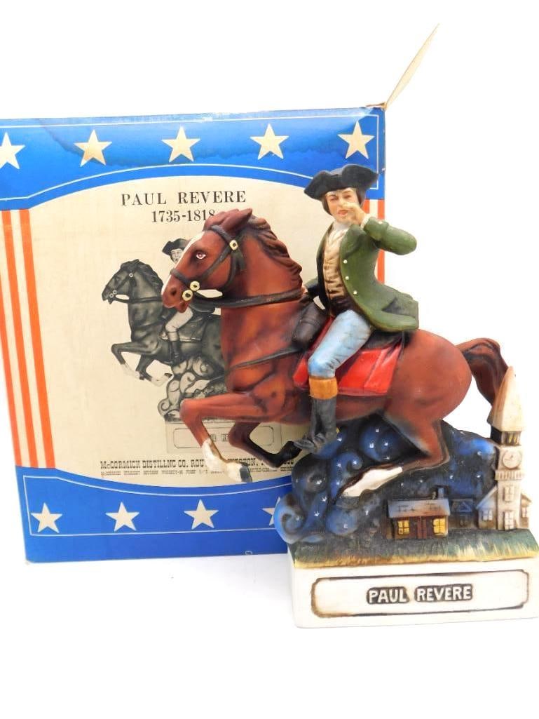 McCormick Paul Revere on Horseback: A McCormick Distilling Co. limited edition porcelain decanter depicting Paul Revere, 1735-1818, at the gallop, hand-painted against a night-sky base with a colonial village and church steeple behind