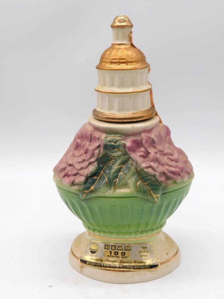 Jim Beam Republican Elephant Kansas: A Jim Beam Regal China decanter modeled as a Republican elephant standing upon a patriotic drum base, with the "Republican" shield and a Kansas convention banner. A spirited political keepsake, and