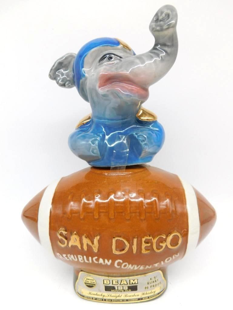 Jim Beam 1972 San Diego Republican: A Jim Beam Regal China decanter marking the 1972 San Diego Republican National Convention, a blue-jerseyed elephant mascot perched atop a football embossed San Diego Republican Convention 1972. A