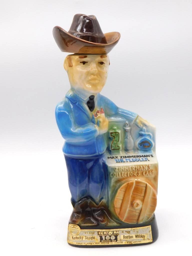 Jim Beam Max Zimmerman The Peddler: A Jim Beam Kentucky Straight Bourbon Whiskey decanter sculpted as Max Zimmerman himself, the peddler, promoting "Zimmerman's, The World's Largest Liquor Store, Chicago." A frank piece of merchant