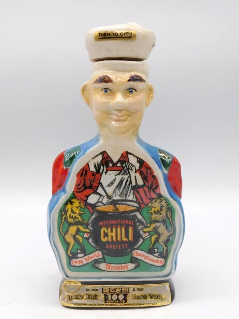 Jim Beam International Chili Society: A Jim Beam Kentucky Straight Bourbon Whiskey decanter modeled as a chef stirring his pot, marking the 1976 World Championship Chili cook-off held by the International Chili Society at Tropico. The