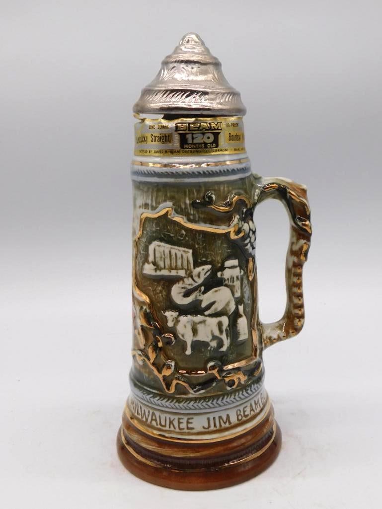 Jim Beam Violet Specialties Club Ceramic: A Jim Beam ceramic decanter from the Specialties Club flower series, molded with a violet blossom and finished with a scrolled handle and silver-tone stopper. The original tax stamp ribbon is present.