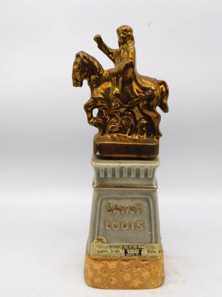 Jim Beam Saint Louis Beam & Specialties: A dignified Jim Beam decanter carrying a gold-luster equestrian statue upon a gray stone pedestal lettered Saint Louis, the reverse marked Greater Saint Louis Area Beam & Specialties Club above a mode