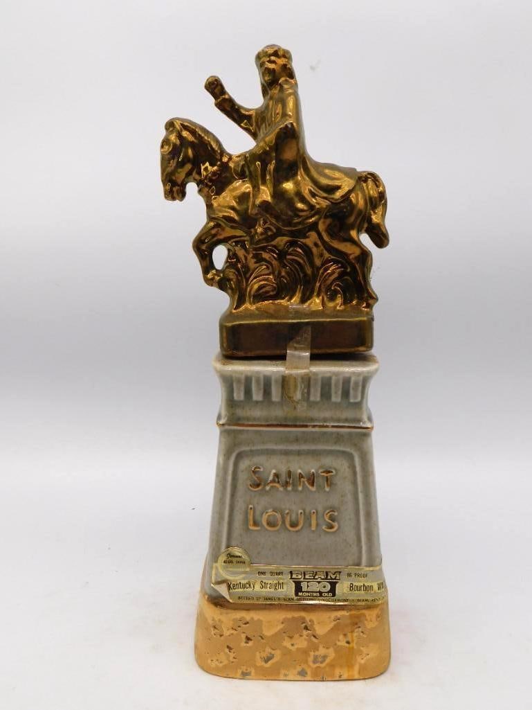 Jim Beam Greater Saint Louis Beam Club: A stately Jim Beam Regal China decanter issued for the Greater Saint Louis Area Beam and Specialties Club, topped with a gold-luster equestrian statue of Saint Louis raised upon a gray pedestal letter