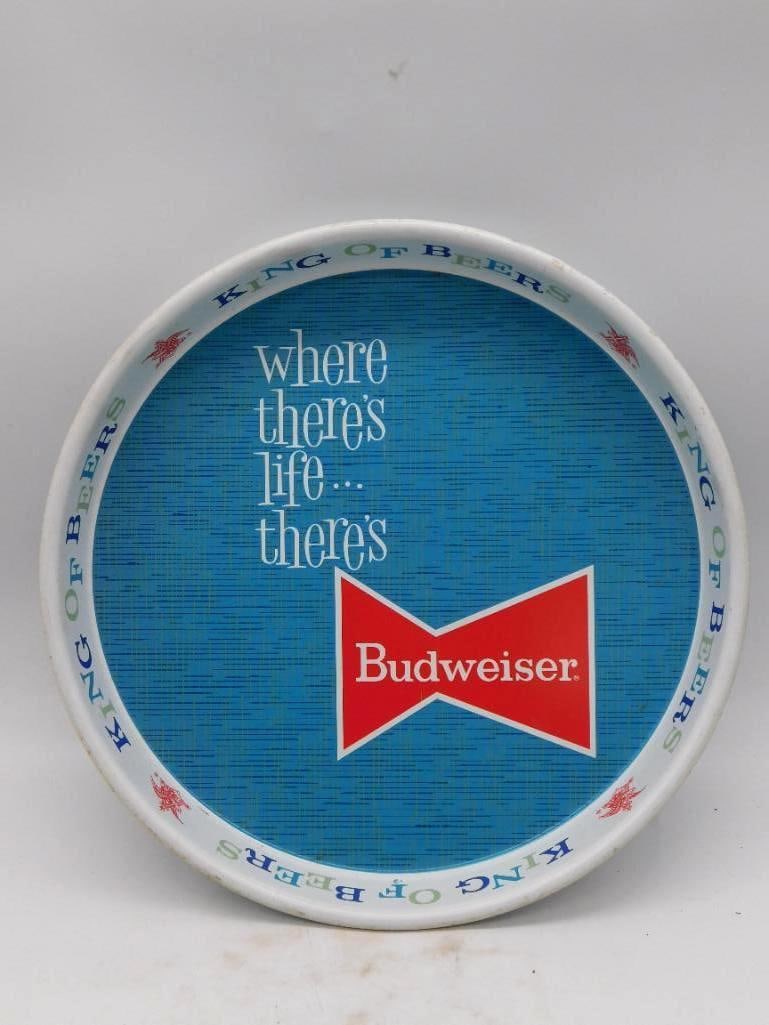 Vintage Budweiser Where There's Life: A round metal Budweiser serving tray in aqua blue, bearing the bow-tie logo and the old slogan, "Where there's life...there's Budweiser, King of Beers." Not a decanter, but a handsome bit of